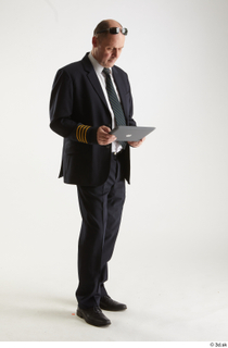 Jake Perry Pilot with IPad standing whole body 0008.jpg